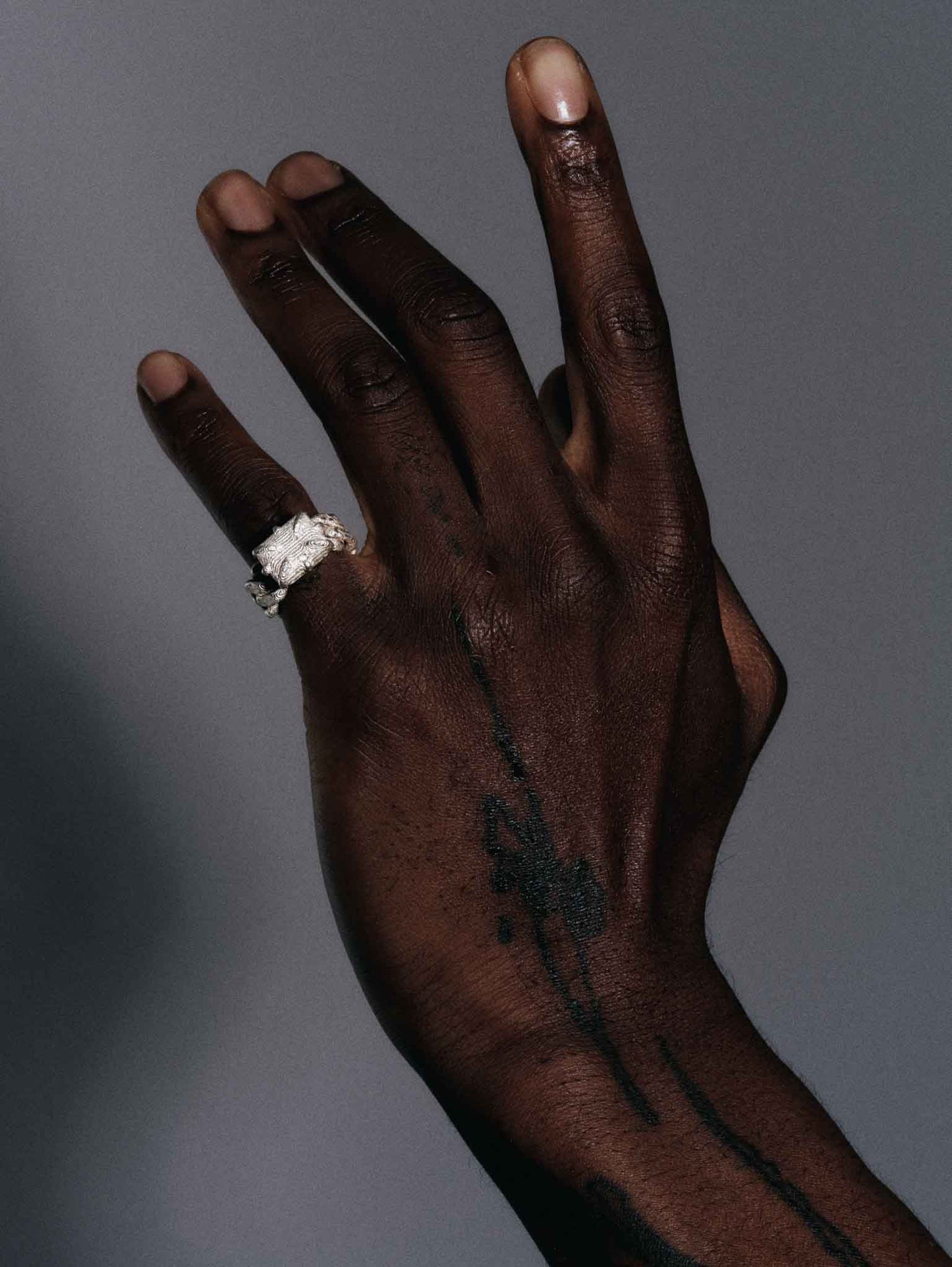 The Rohma Ring – Textured Solid Silver Cuban Chain with Emerald